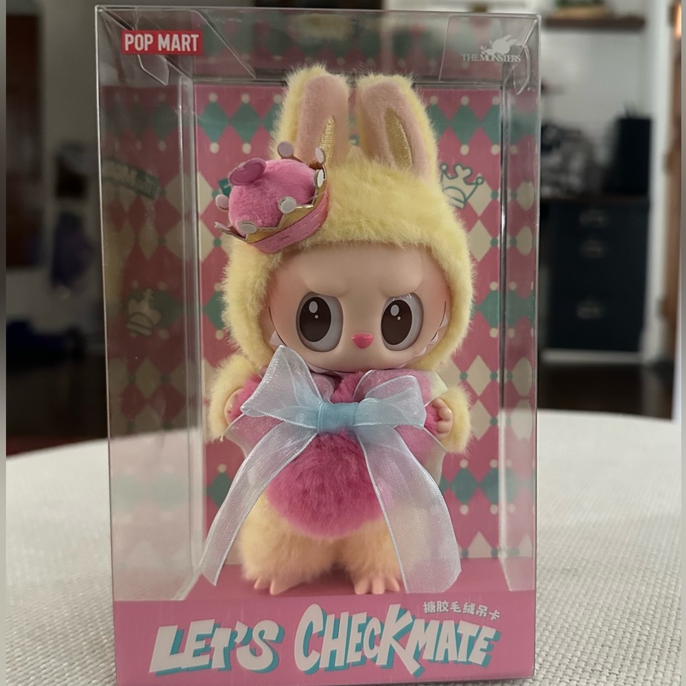 The Labubu Checkmate Queen is a collectible toy from Pop Mart's. The Monsters